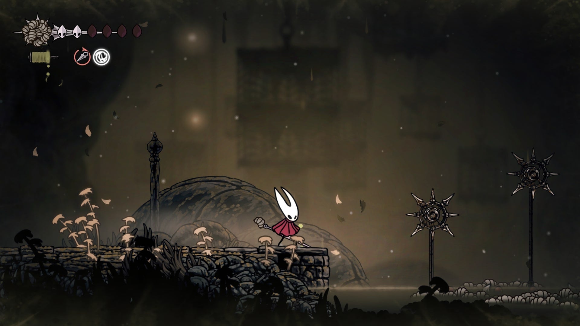 Hornet stands on a platform beside some spiked wheels in Sinner's Road in Hollow Knight: Silksong