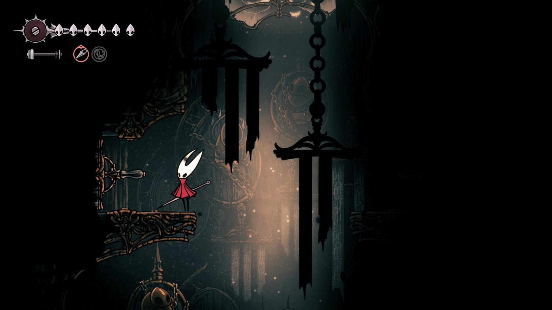 Hornet stands by the entrance to the Chapel of the Architect in the Underworks in Hollow Knight: Silksong