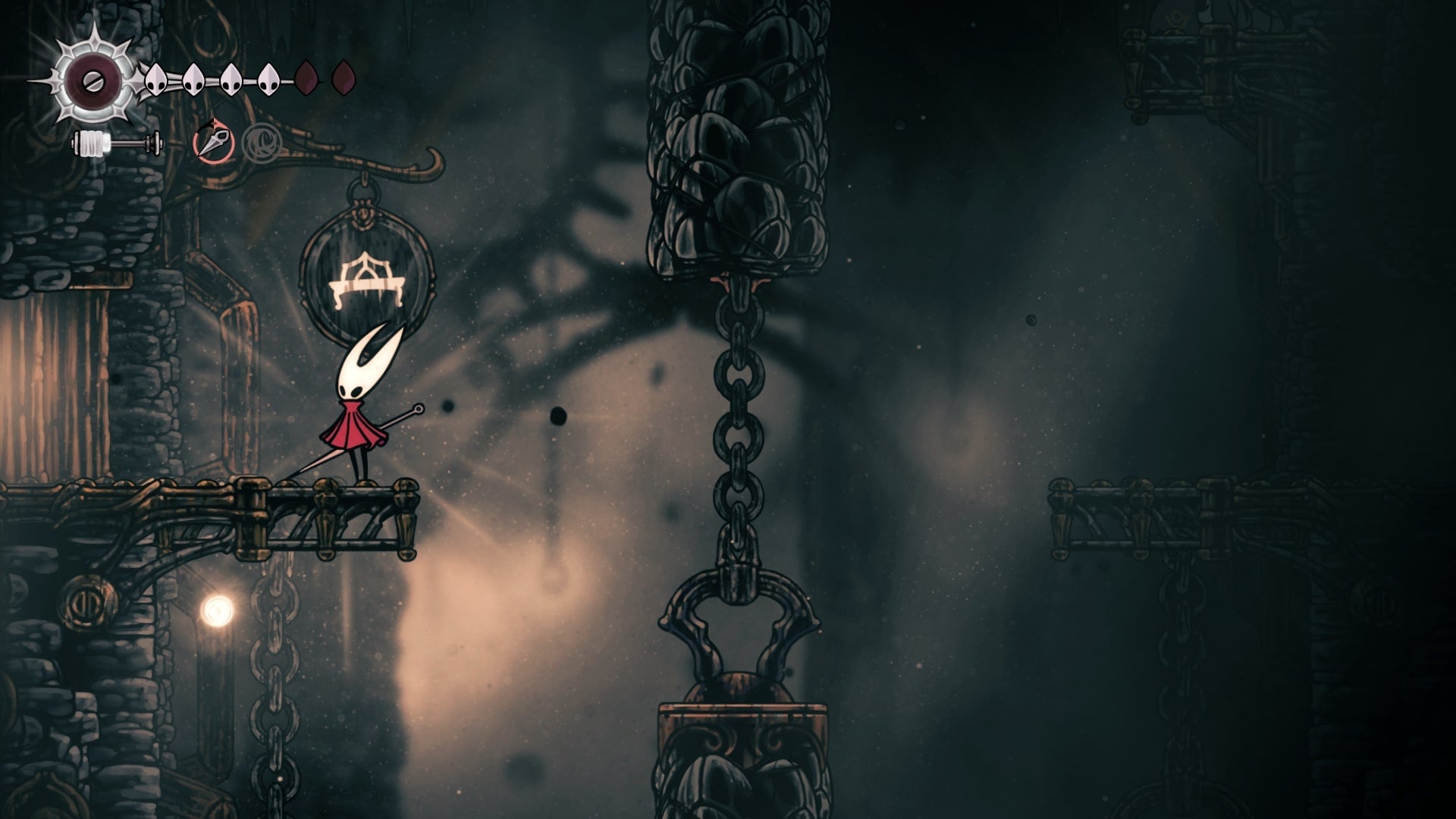 Hornet stands beneath a Bench sign in the Underworks in Hollow Knight: Silksong