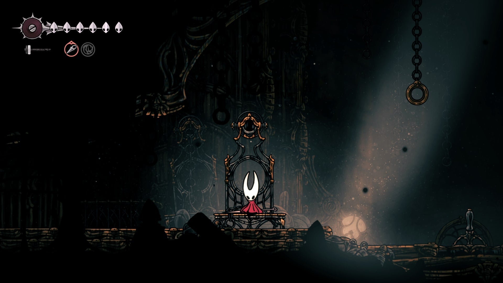 Hornet rests at a Bench in the Underworks in Hollow Knight: Silksong