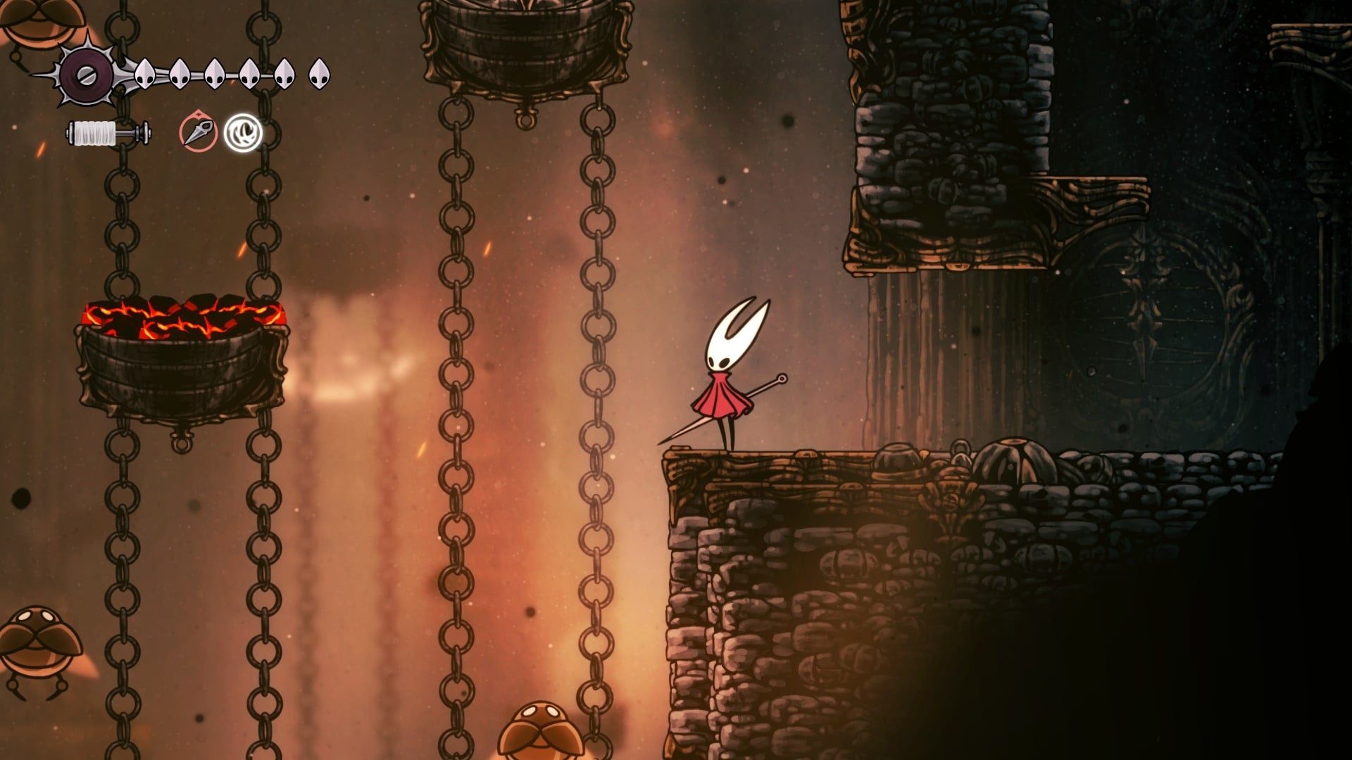 Hornet stands on a ledge beside some molten platforms and Cogwork Underflies in the Underworks in Hollow Knight: Silksong