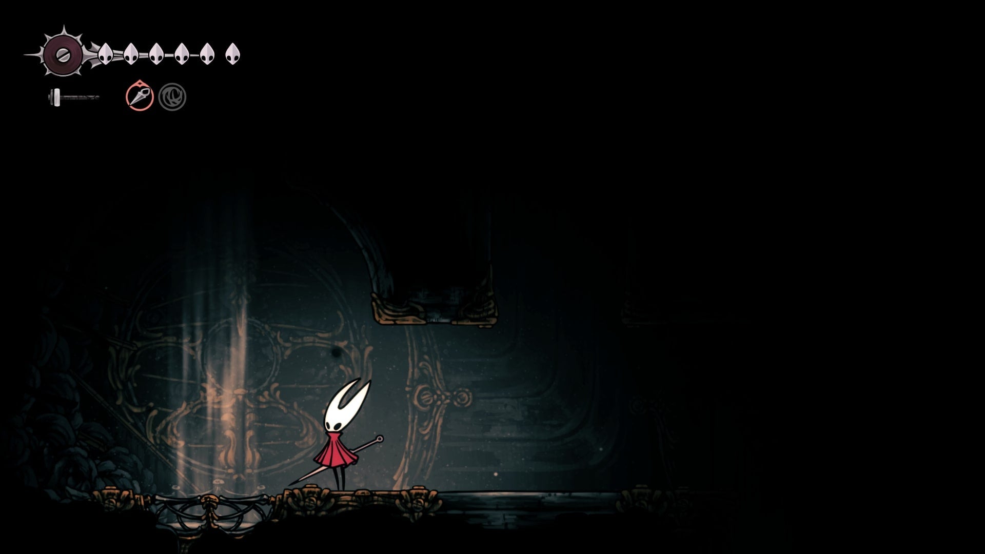 Hornet stands next to a fan in the Underworks in Hollow Knight: Silksong