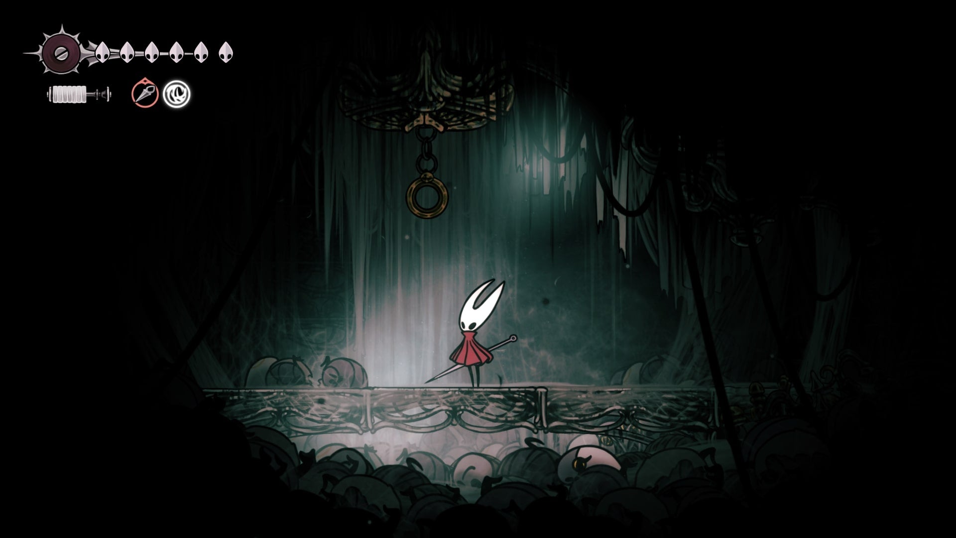 Hornet stands beside a disc she can use the Clawline Skill on in Whiteward in Hollow Knight: Silksong