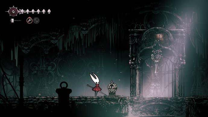Hornet stands beside the Whiteward elevator in Hollow Knight: Silksong