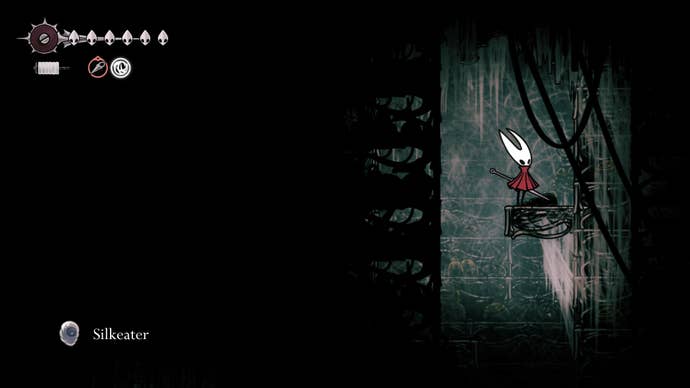 Hornet stands in a room where a Silkeater can be found in Whiteward in Hollow Knight: Silksong