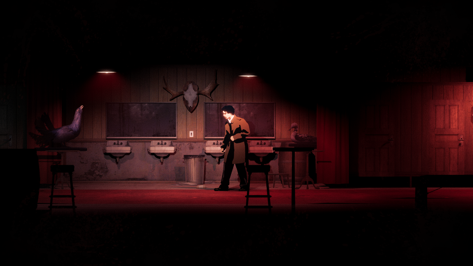 A moody, red-lit bar bathroom in Silver Pines.