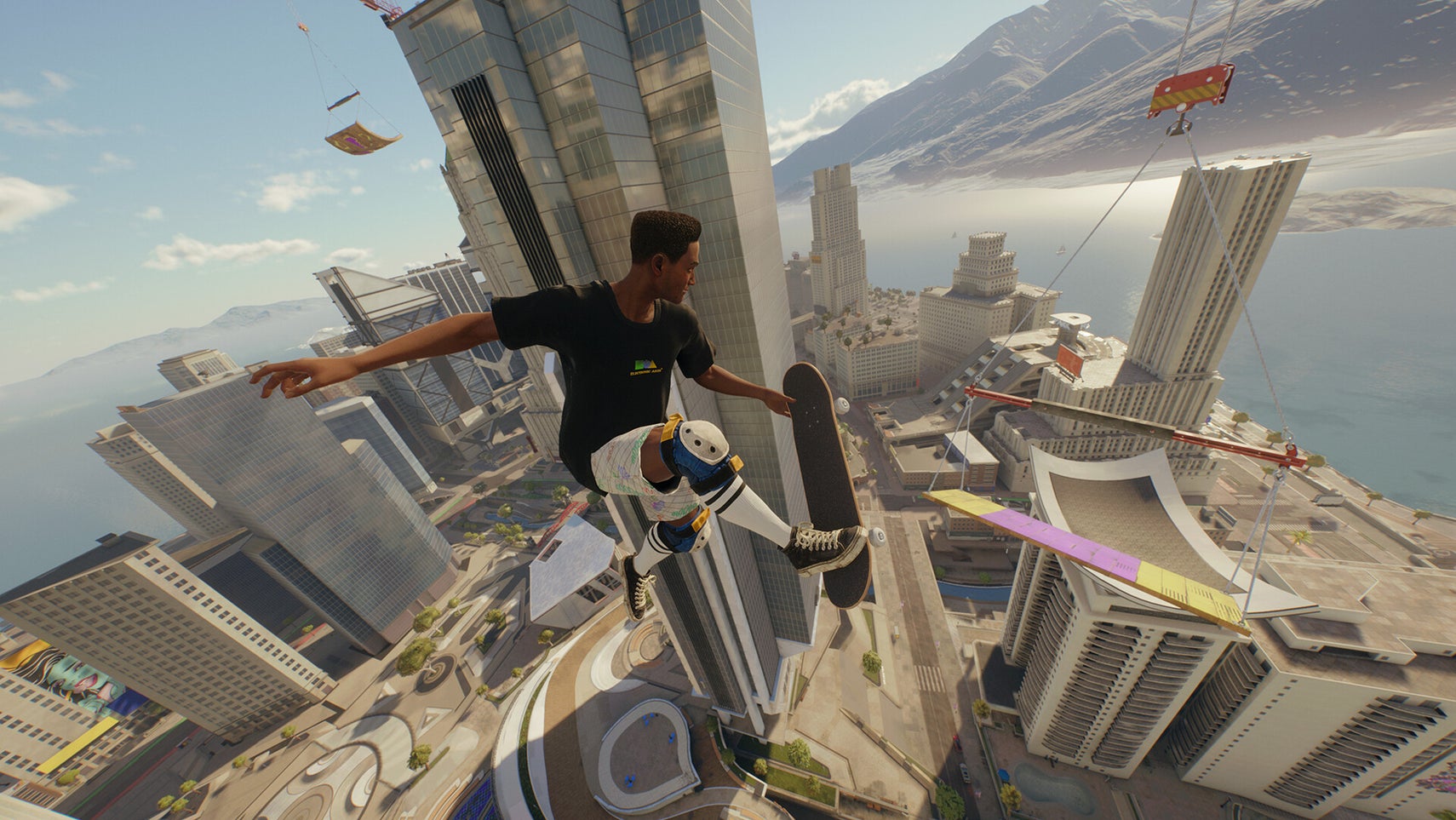 Skate screenshot showing a boarder doing tricks high above a city