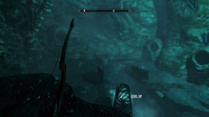 A murky cave landscape in Skyrim