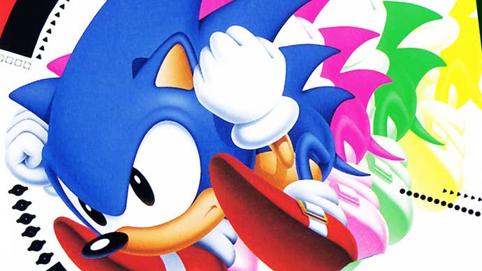 Sonic Spinball, with little Sonic hunched over like a pinball, with pink, green, and yellow ‘echoes’ of him behind.