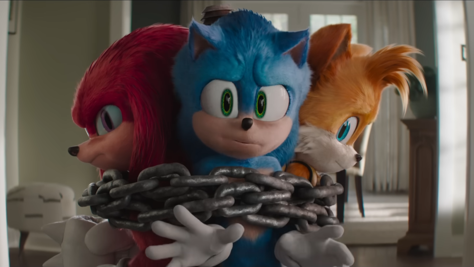 Sonic the Hedgehog 3 trailer screenshot showing Sonic, Knuckles and Tails in chains