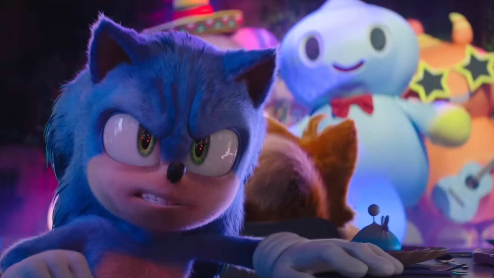 Sonic the Hedgehog 3 film trailer screenshot showing angry sonic with giant Chao character in the background
