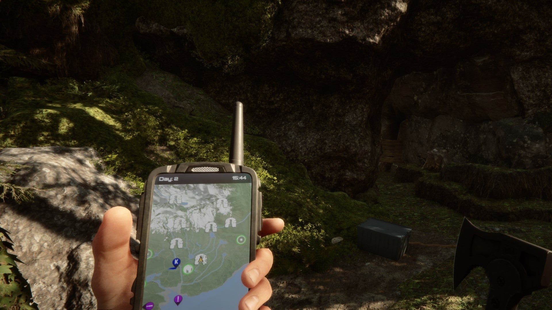 A player stares at their GPS in Sons of the Forest. - 5
