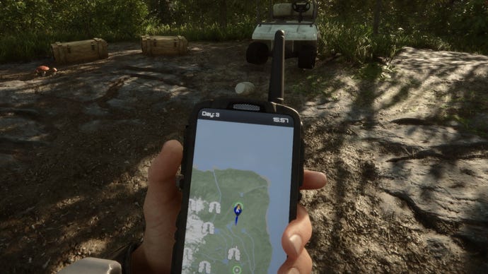 A player stares at their GPS in Sons Of The Forest.