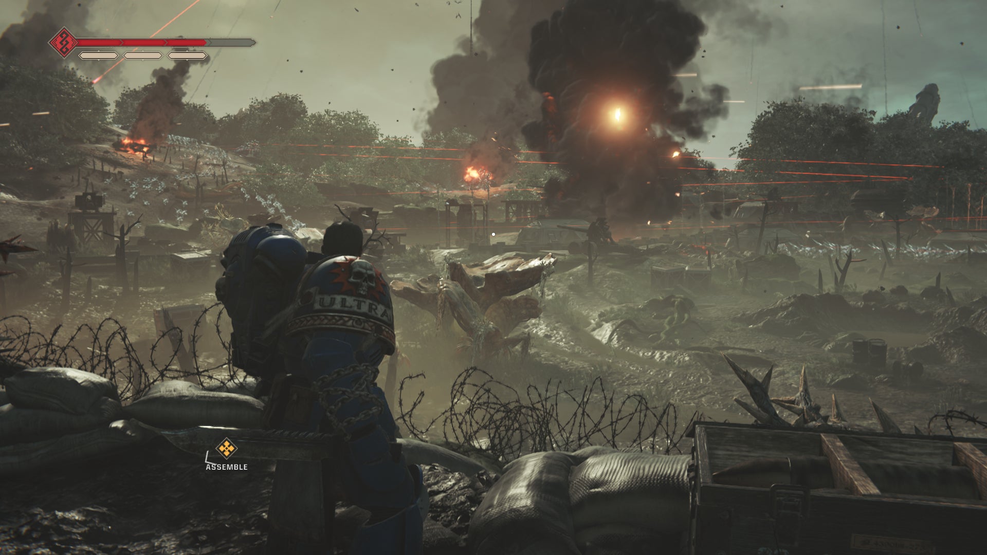 A war scene on Warhammer 40,000: Space Marine 2's planet Kadaku as thousands of Tyranids rush an Imperial defence. - 1