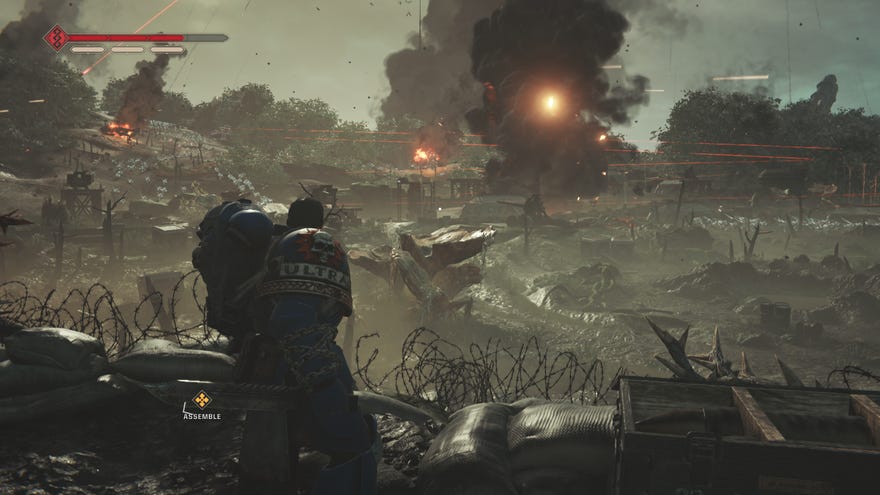 A war scene on Warhammer 40,000: Space Marine 2’s planet Kadaku as thousands of Tyranids rush an Imperial defence.