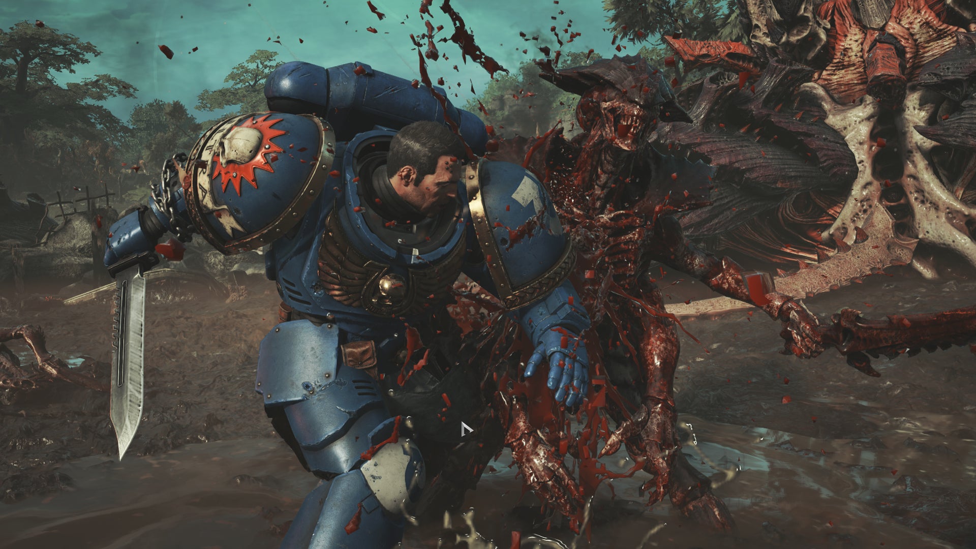 Titus primes a combat knife for the killing blow against a Tyranid Warrior in Warhammer 40,000: Space Marine 2. - 5