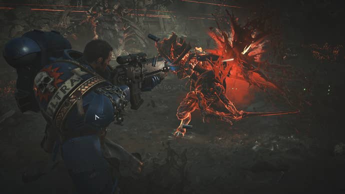 Titus blasts a Tyranid Warrior to bits in Warhammer 40,000: Space Marine 2.