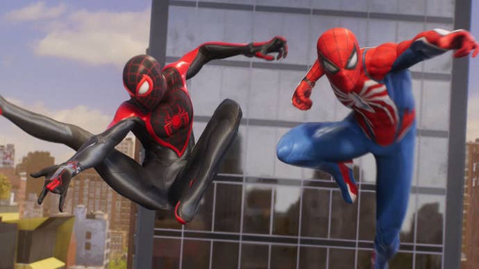 A screenshot from Marvel’s Spider-Man 2 showing Miles Morales and Peter Parker in their Spider suits posing dramatically mid-air.
