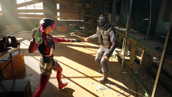 A woman prepares to throw a bottle at a guard in Spine