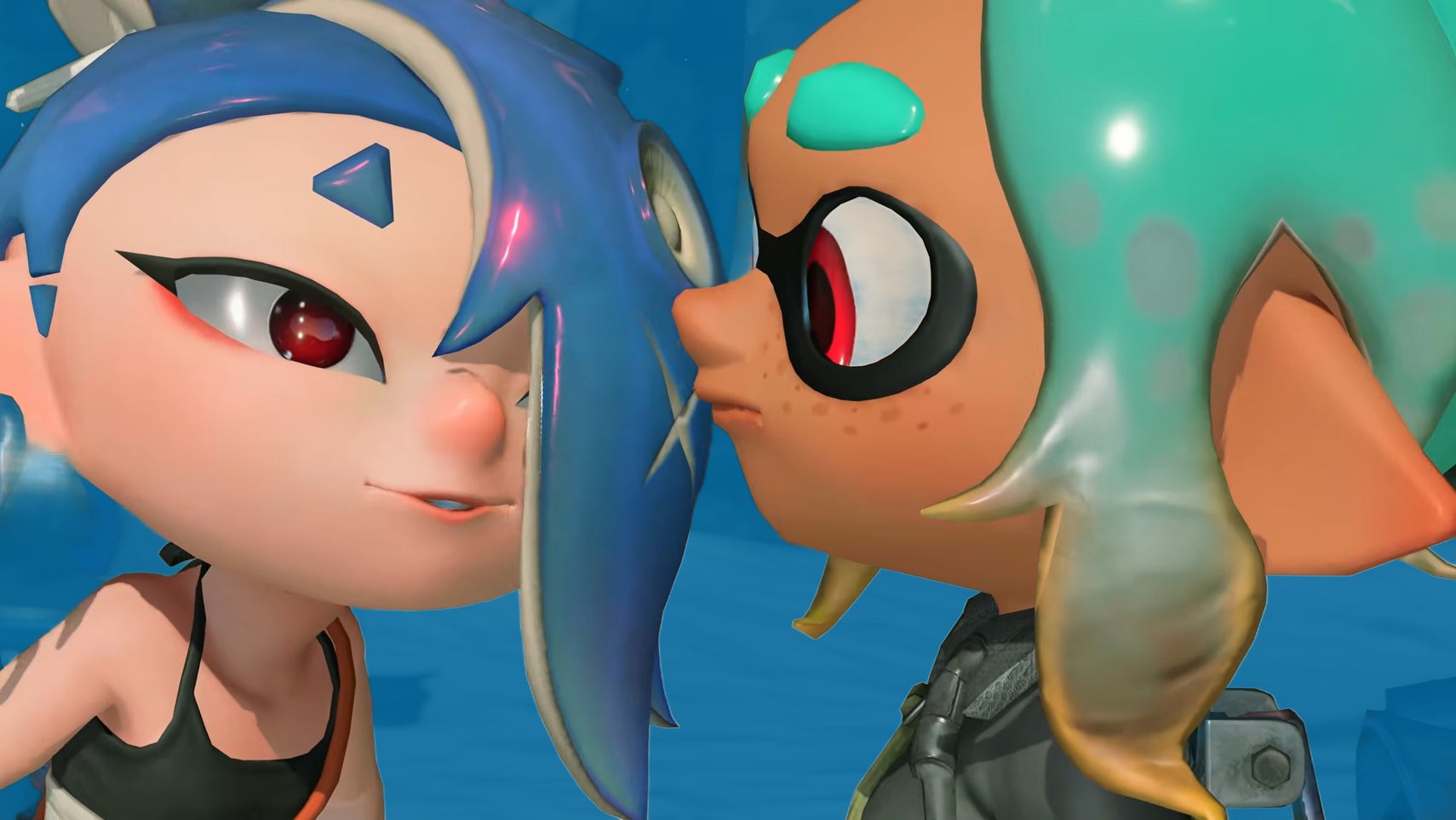 Splatoon Raiders characters look at each other closely. One has blue hair over their eye, the other has green hair