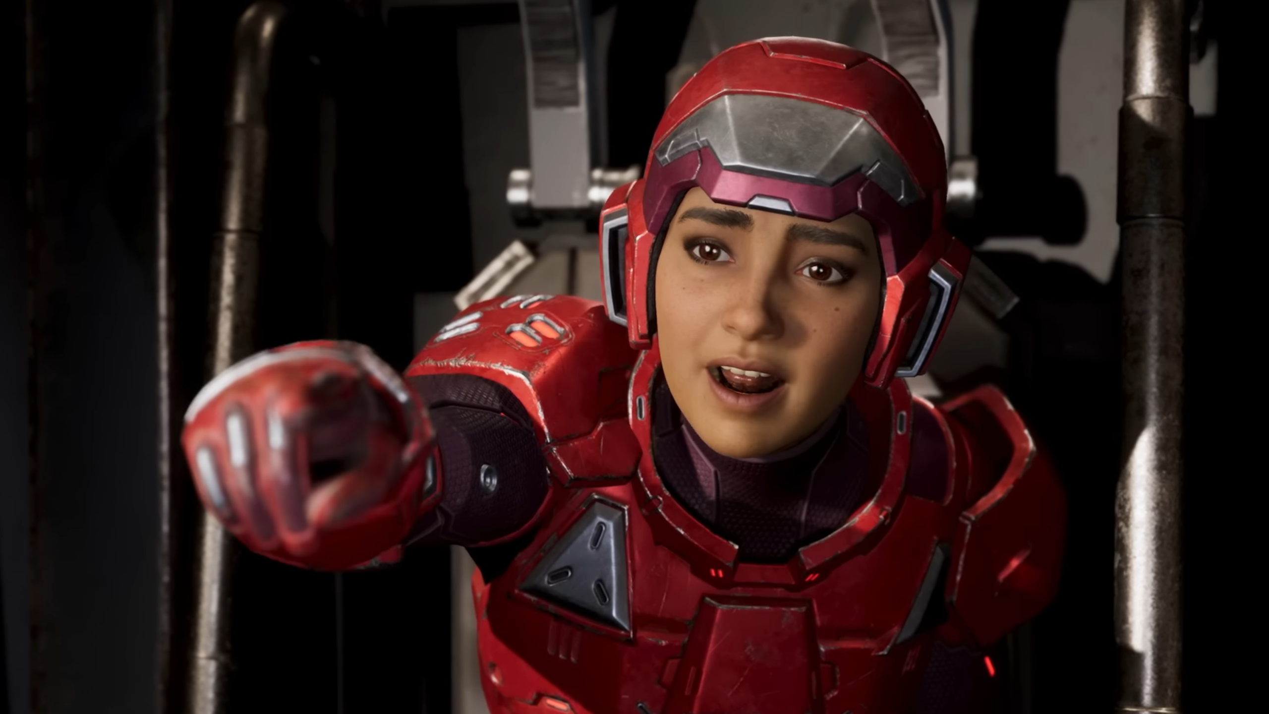 Split Fiction screenshot showing woman in red futuristic armour pointing at the camera