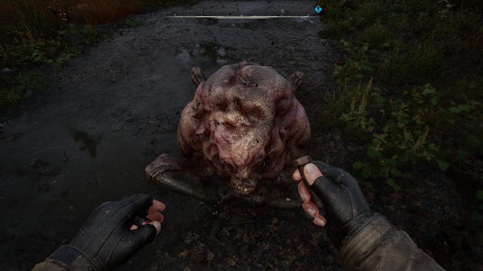 A strangely non-aggressive Flesh lies down in STALKER 2: Heart of Chornobyl.