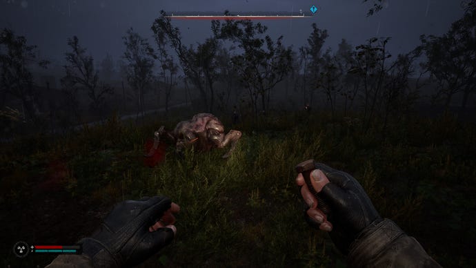 Ward soldiers shoot at a Flesh in STALKER 2: Heart of Chornobyl.