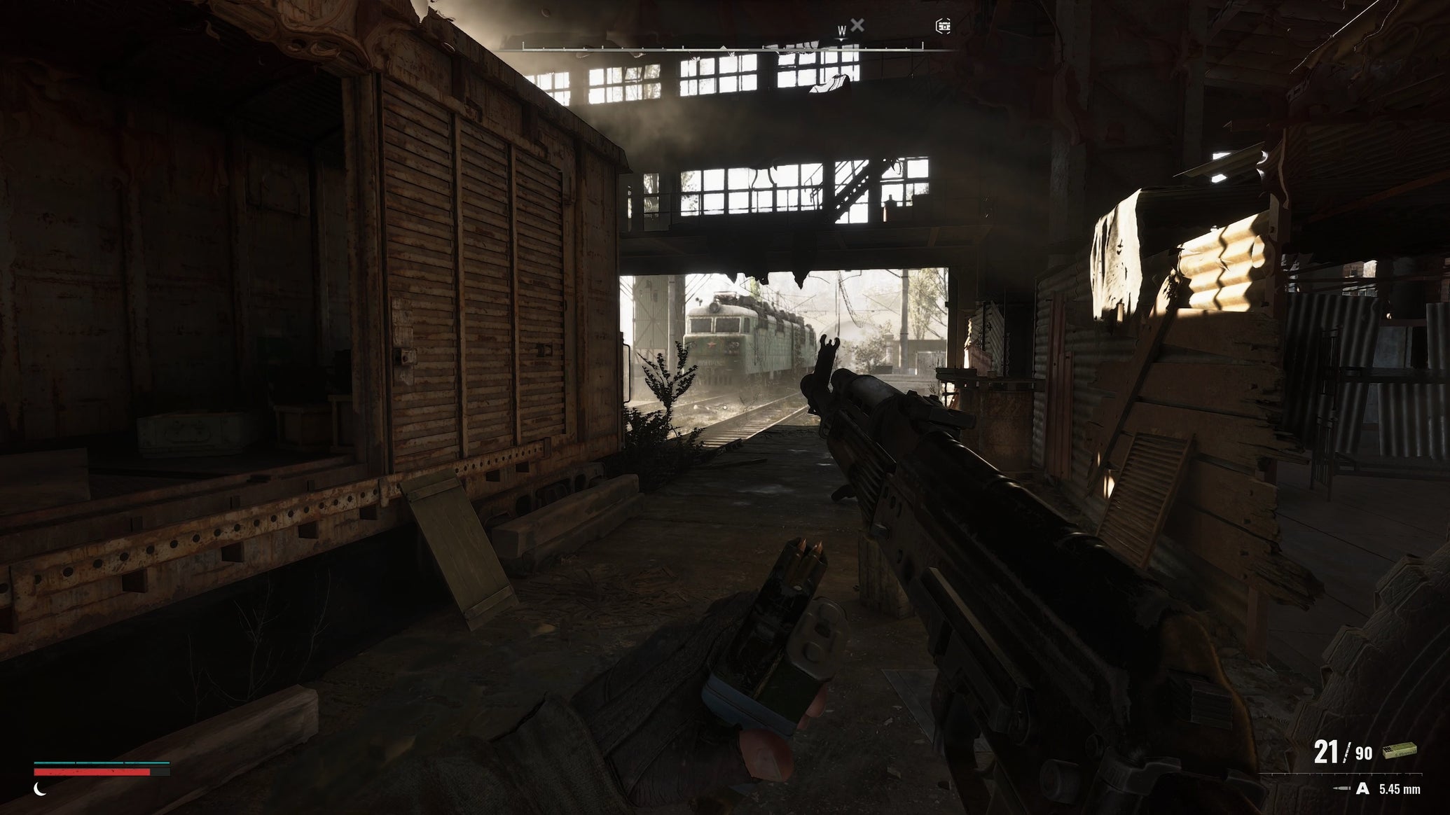 The player reloads their gun while in a depot in Stalker 2 - 1