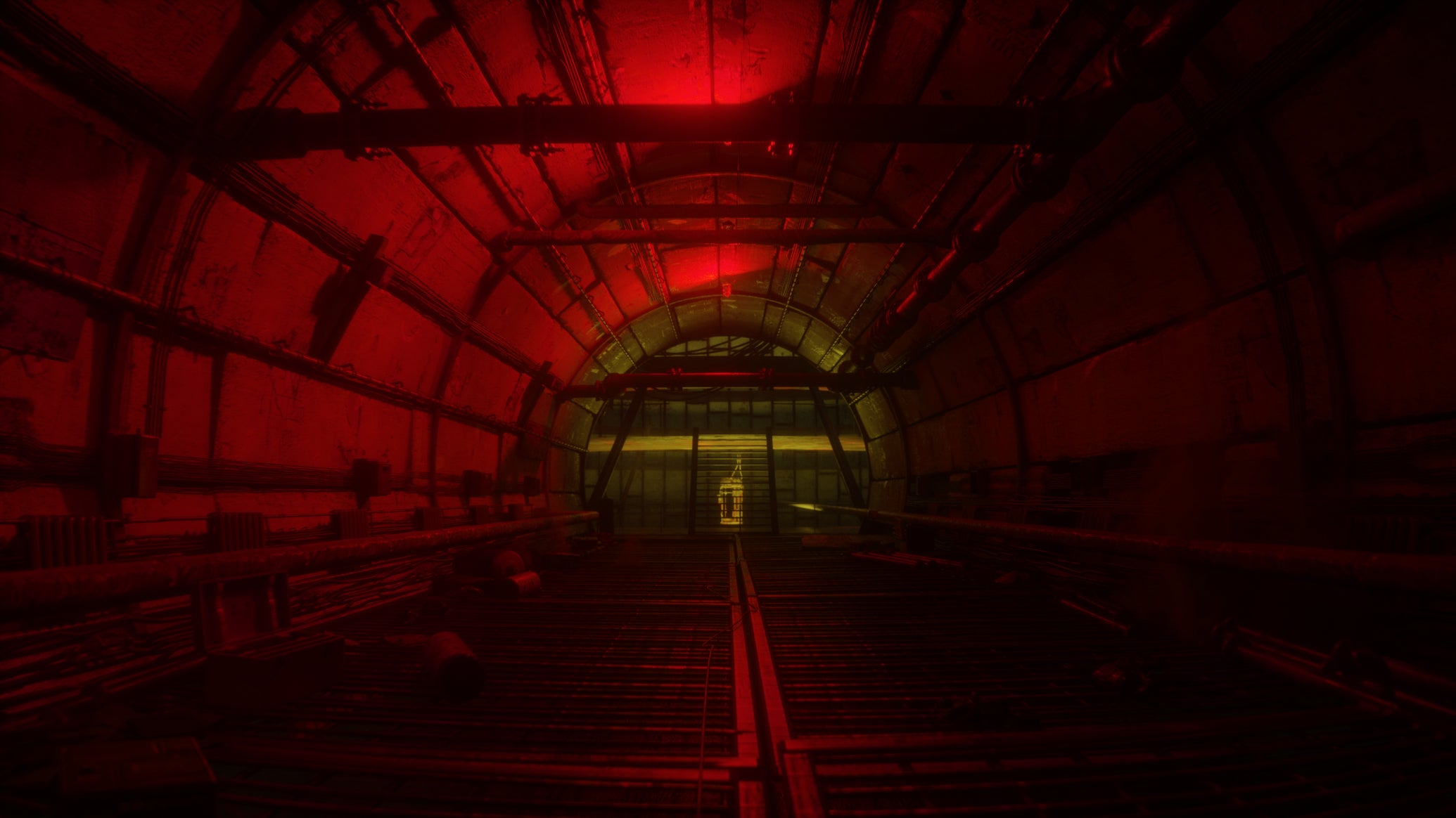 Skif walks through a tunnel illuminated by red light in Stalker 2 - 1