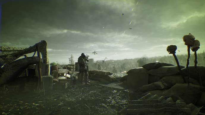 The player stands on a hill near a stranger in Stalker 2