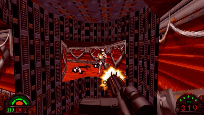 The player shoots Stormtroopers in a tunnel in Star Wars Dark Forces Remaster