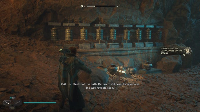 Star Wars Jedi: Survivor screenshot showing Cal stood by some statues in a desert cave.