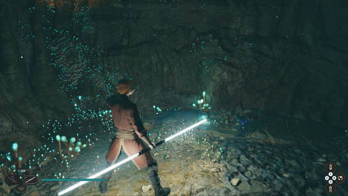 Star Wars Jedi Survivor screenshot showing Cal stood in a dark tunnel.