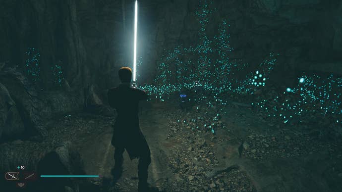 Star Wars Jedi Survivor screenshot showing Cal stood in a dark tunnel.