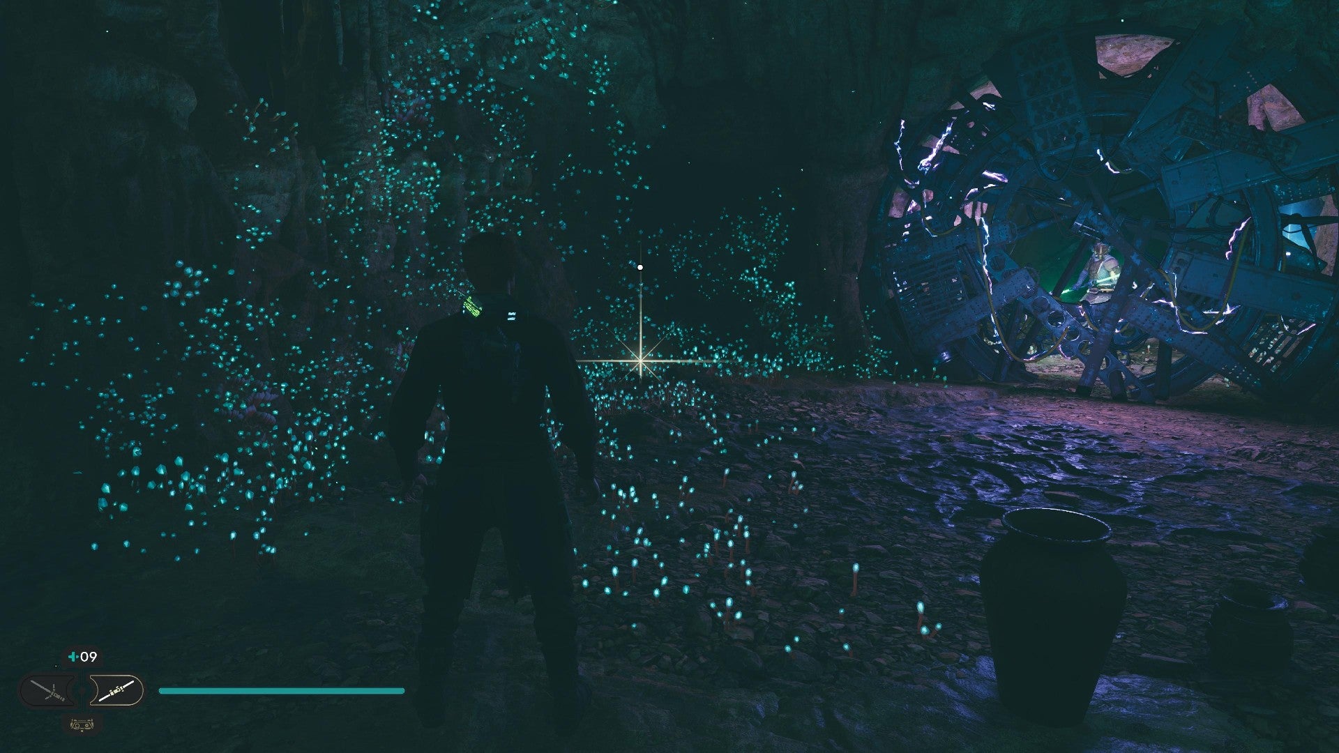 Star Wars Jedi Survivor screenshot showing Cal stood near a glistening Datadisc in a dark cave.