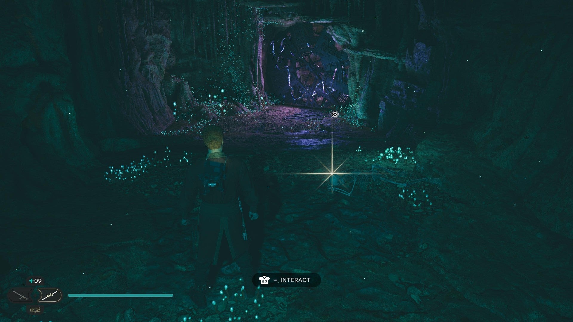 Star Wars Jedi Survivor screenshot showing Cal stood near a glistening Datadisc in a dark cave.