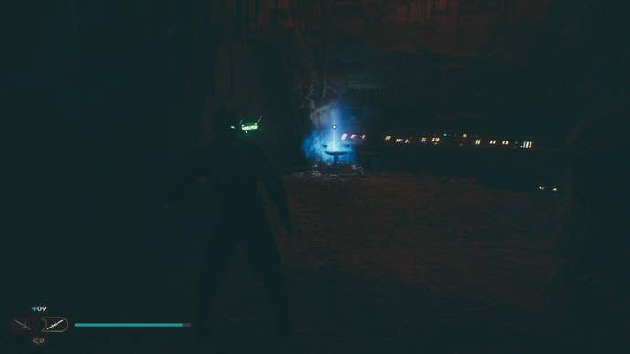 Star Wars Jedi Survivor screenshot showing Cal stood in a dark tunnel.