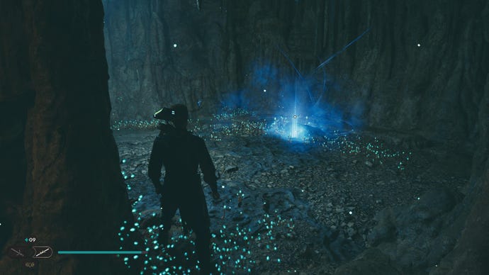 Star Wars Jedi Survivor screenshot showing Cal stood in a dark tunnel.