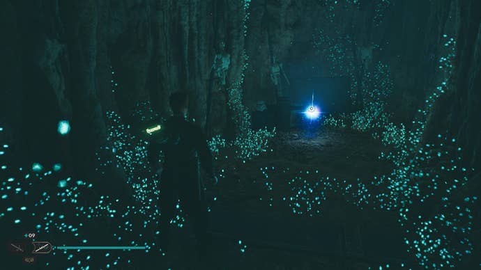 Star Wars Jedi Survivor screenshot showing Cal near a glistening Skill Point Essence in a dark cavern.