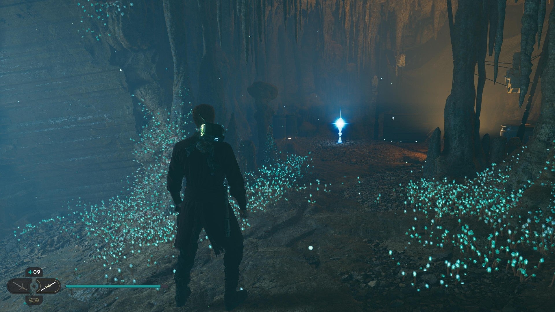 Star Wars Jedi Survivor screenshot showing Cal near a glistening Skill Point Essence in a dark cavern.