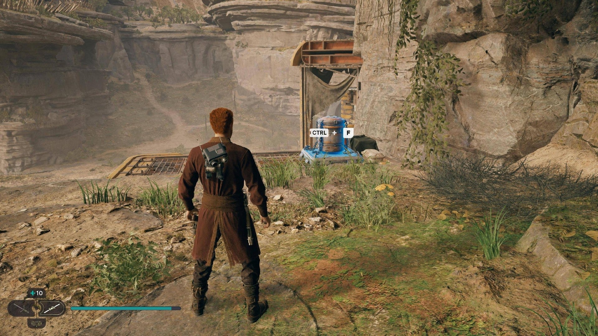 Star Wars Jedi Survivor screenshot showing Cal stood near a chest.