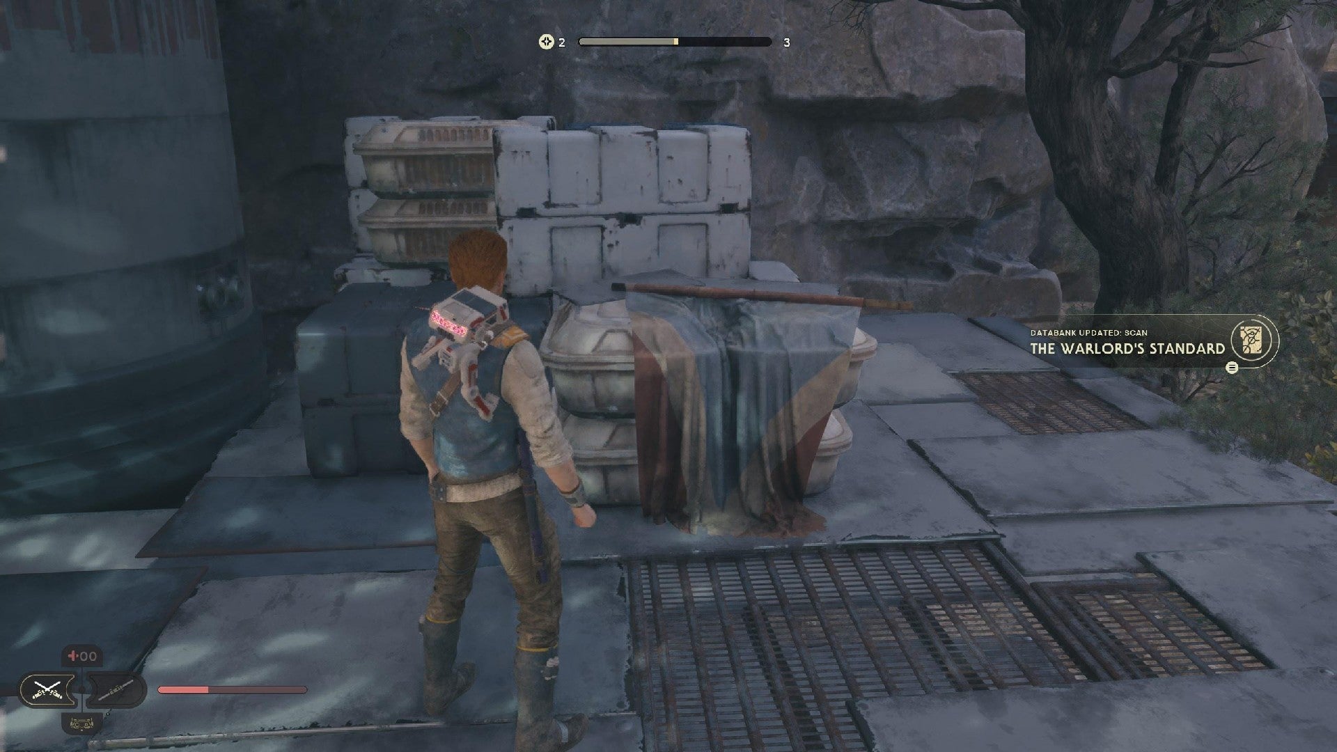 Star Wars Jedi Survivor screenshot showing Cal next to some crates with a pop-up reading &lsquo;Databank Scan: The Warlord&rsquo;s Standard&rsquo;