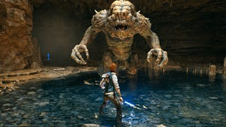 Cal faces a big beast in a cave in a screenshot from Star Wars Jedi Survivor