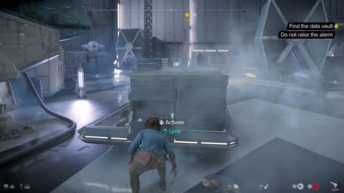Kay crouched behind a trolley in Star Wars Outlaws.