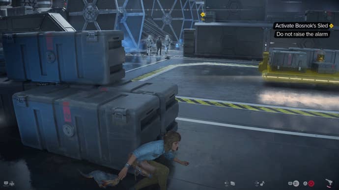 Kay crouched behind boxes and looking at a group of enemies walking away in Star Wars Outlaws.