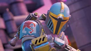 Star Wars: Hunters trailer screenshot showing Mandalorian-style player character in close up