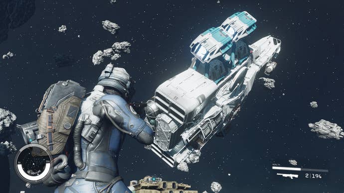 A Starfield player hanging in space near a UC patrol ship.