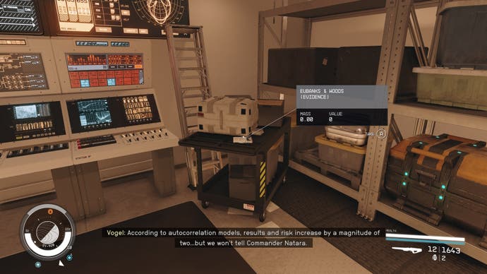 first person view of an evidence log on top of a black trolly in a room with large computers and boxes