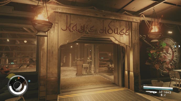 first person view of the entrance to kay's house, a humble diner in the rundown well area of new atlantis