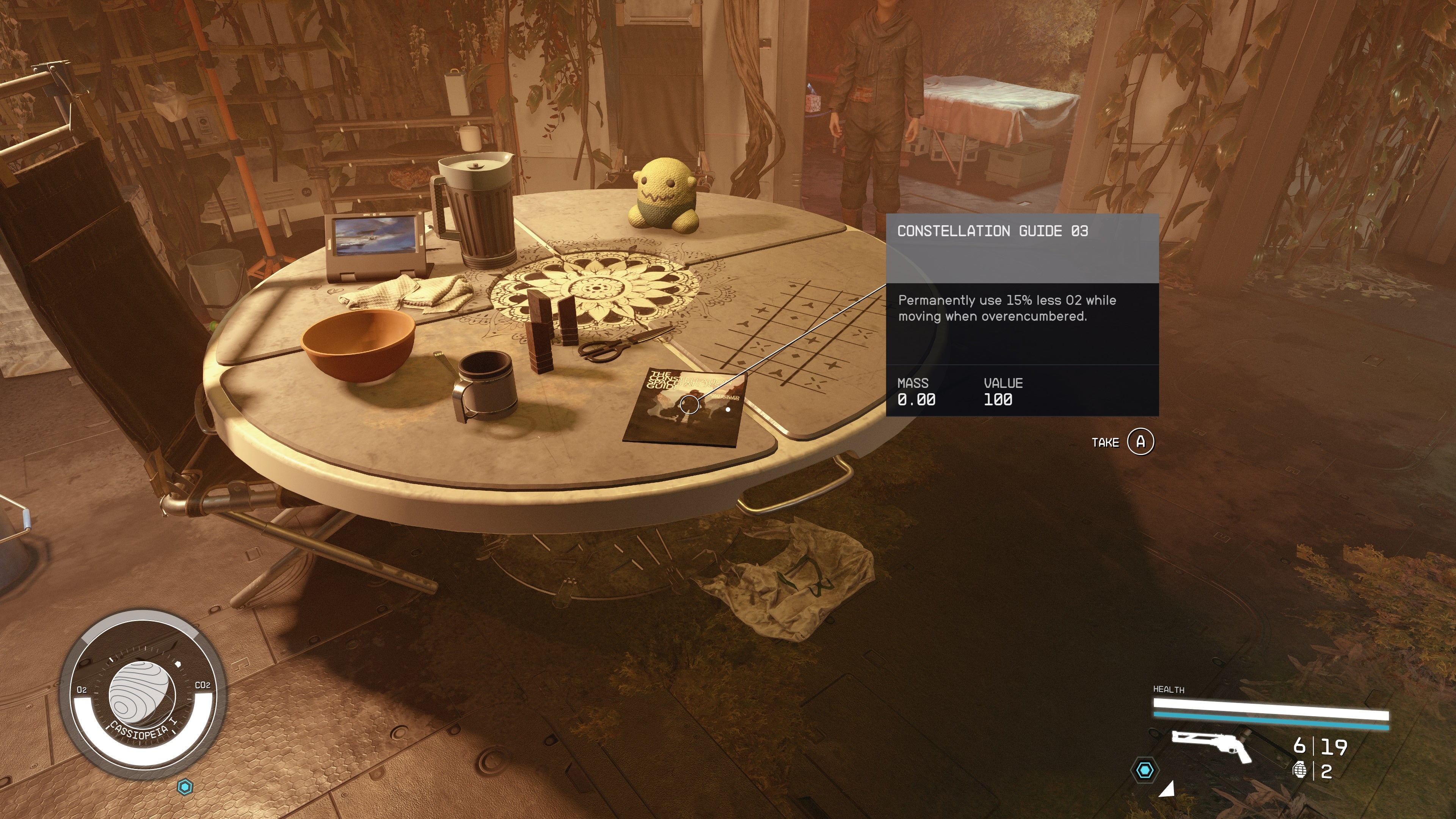 first person view of a constellation guide skill book on a round cluttered table